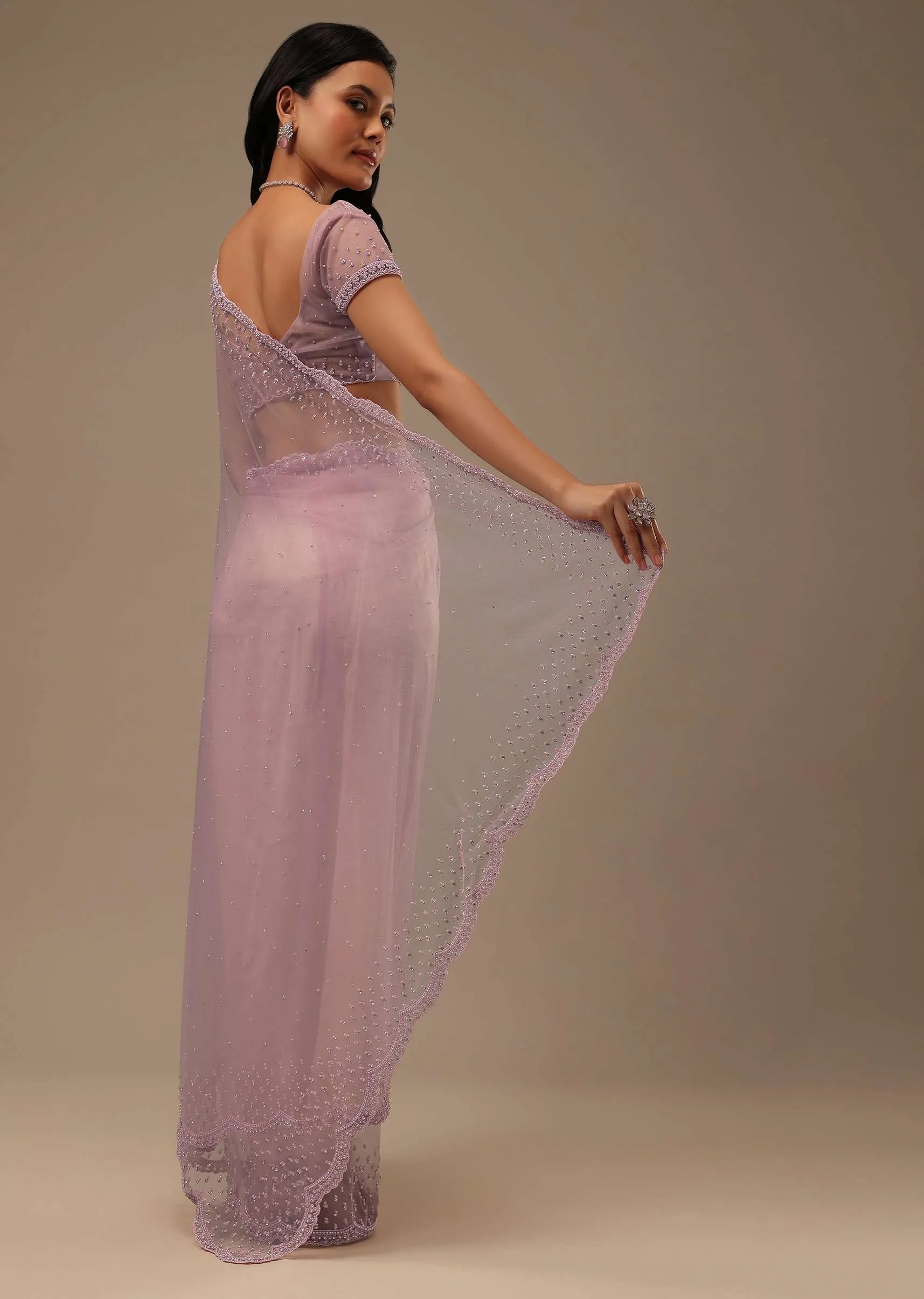 Lavender Pink Stone And Beads Embellished Net Saree
