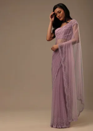 Lavender Pink Stone And Beads Embellished Net Saree