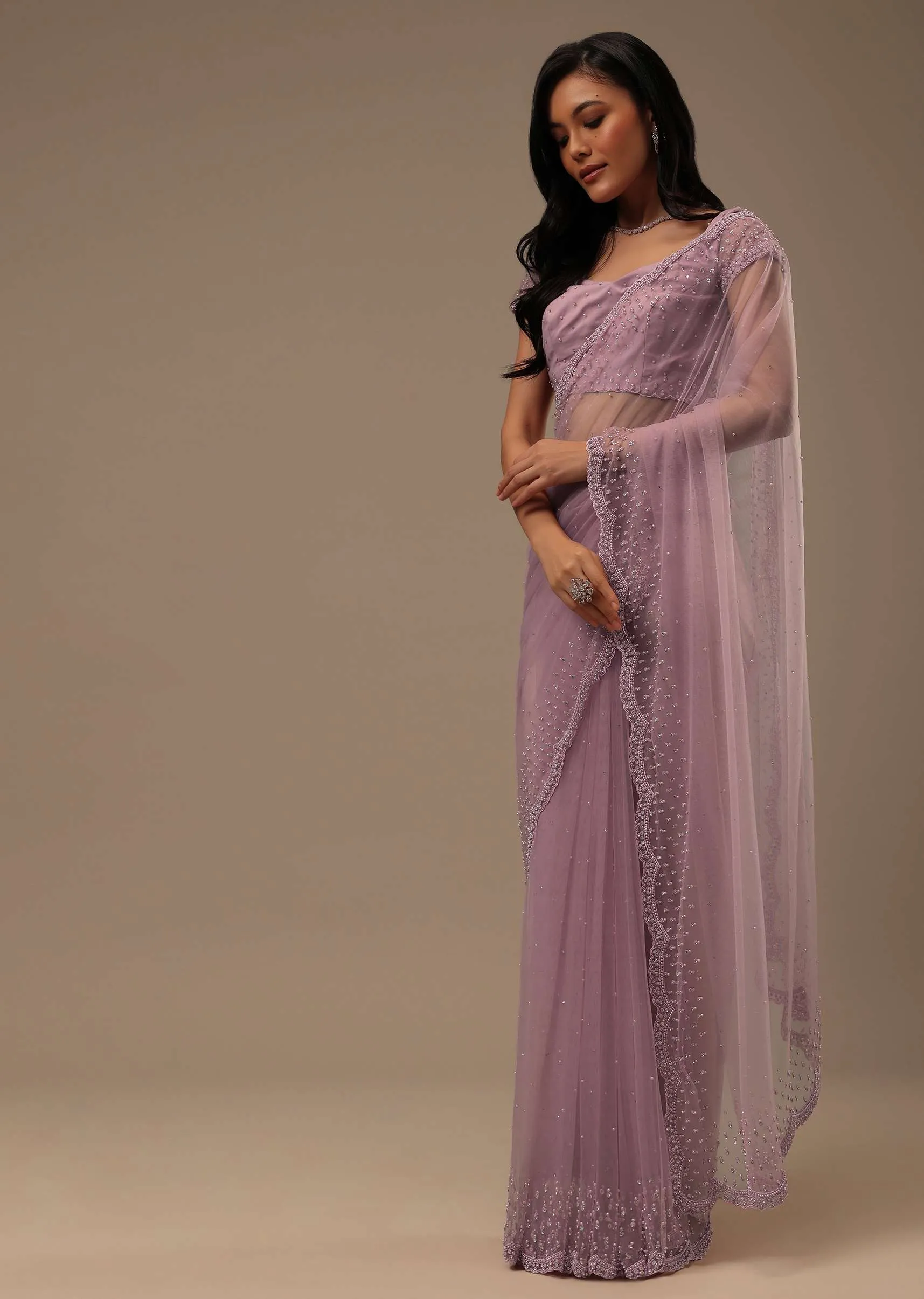 Lavender Pink Stone And Beads Embellished Net Saree